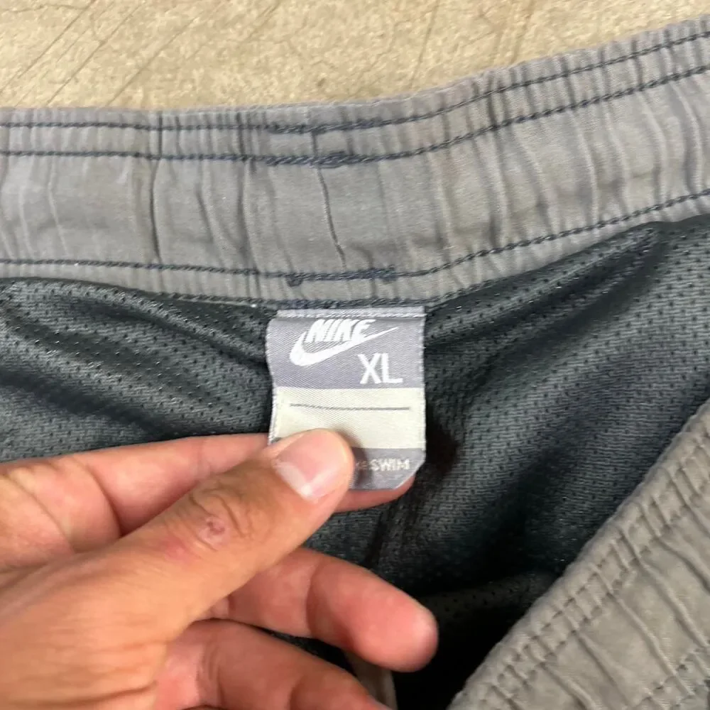 Y2K Nike gray swim shorts with white and orange stripes